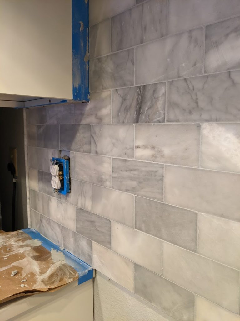DIY marble subway tile backsplash, my first tile project, how to tile a backsplash, tiling with natural stone, marble kitchen backsplash